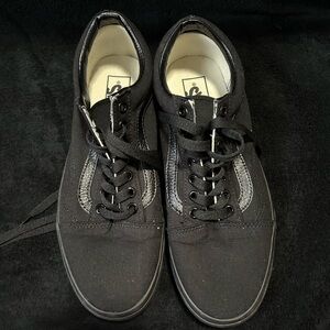Black Vans, 8.0 in men’s and 9.5 in women’s.